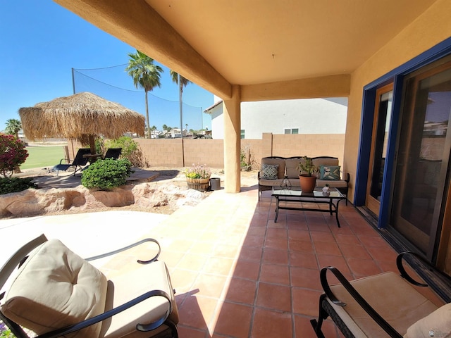 view of patio / terrace featuring outdoor lounge area and a fenced backyard