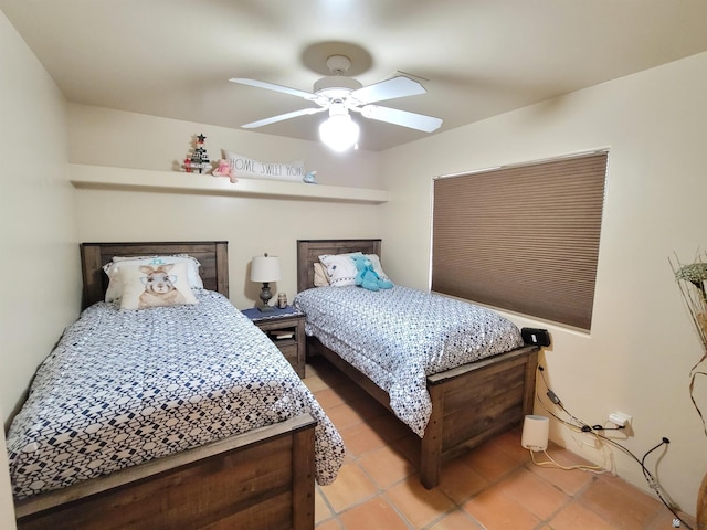 bedroom with light tile patterned flooring and a ceiling fan