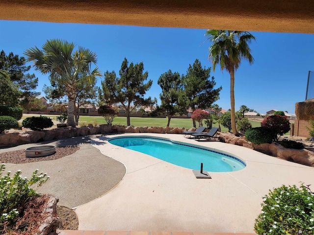 pool with a patio