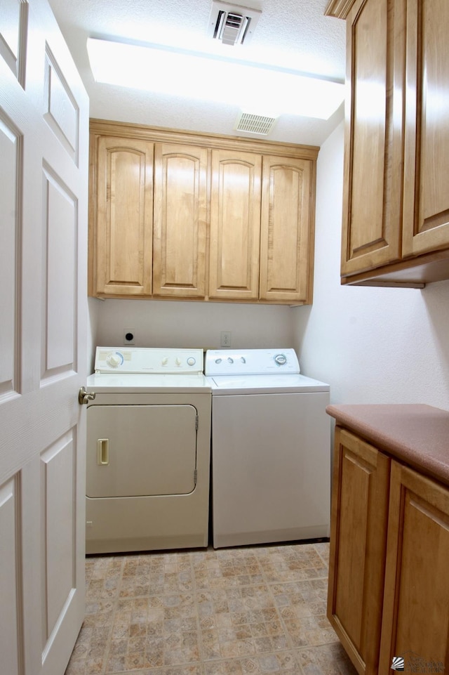 1565 W Vicky Ln, Yuma, AZ 85364 - washroom featuring cabinet space, visible vents, and washer and clothes dryer