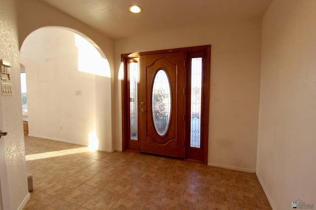 1565 W Vicky Ln, Yuma, AZ 85364 - foyer with baseboards, arched walkways, and recessed lighting