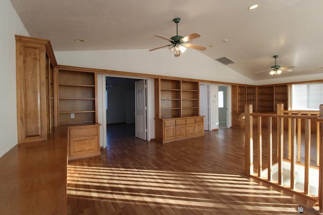 1565 W Vicky Ln, Yuma, AZ 85364 - interior space featuring a ceiling fan, visible vents, built in features, dark wood-style floors, and lofted ceiling
