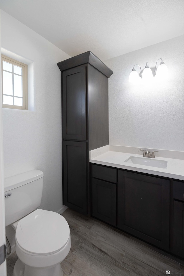 10858 E 45th St, Yuma, AZ 85367 - bathroom featuring vanity and wood finished floors