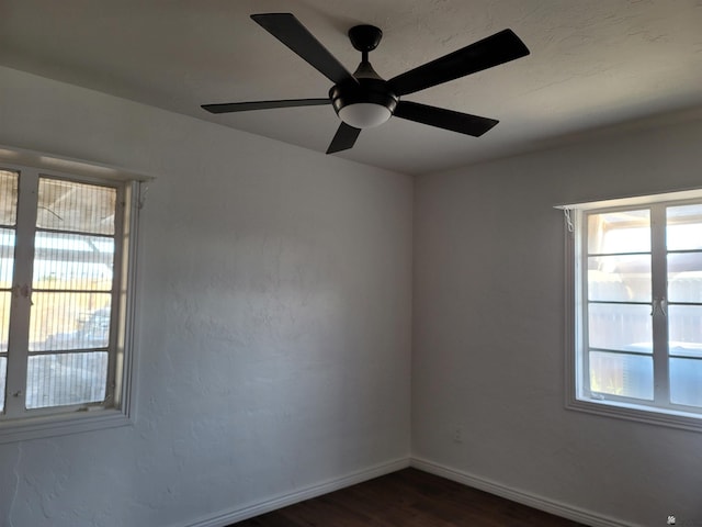 1995 S 10th Ave, Yuma, AZ 85364 - spare room with baseboards, ceiling fan, and dark wood finished floors