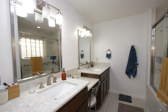 6767 E Mountain View Pl, Yuma, AZ 85365 - full bath with a sink, tile patterned floors, a shower with door, and two vanities