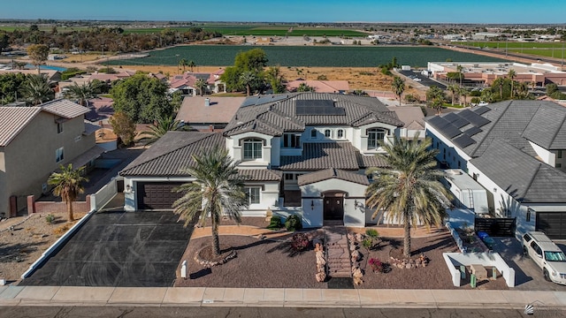 birds eye view of property with a residential view