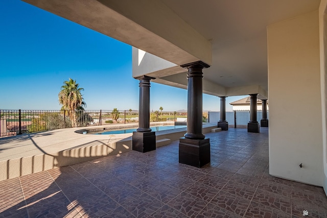 view of patio featuring a fenced in pool and fence