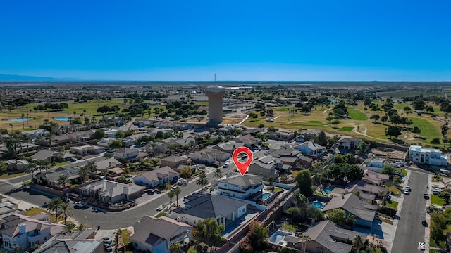 birds eye view of property featuring a residential view and golf course view