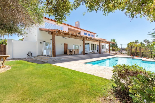 1645 W El Paseo Real, Yuma, AZ 85364 - rear view of property featuring a chimney, a patio, stucco siding, and ceiling fan