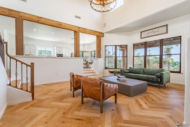 1645 W El Paseo Real, Yuma, AZ 85364 - living room featuring a chandelier, stairway, recessed lighting, and a towering ceiling