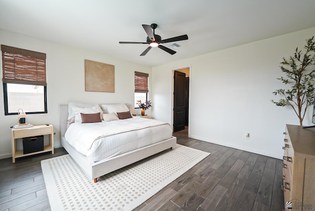 7563 E 35th Ln, Yuma, AZ 85365 - bedroom with dark wood-style floors, baseboards, and ceiling fan