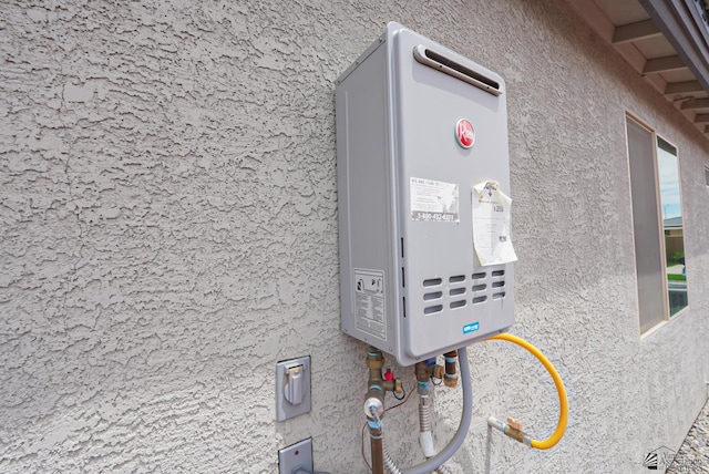 7563 E 35th Ln, Yuma, AZ 85365 - exterior view of stucco siding and water heater