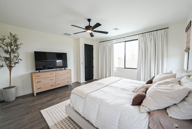 7563 E 35th Ln, Yuma, AZ 85365 - bedroom featuring dark wood-type flooring, ceiling fan, and baseboards