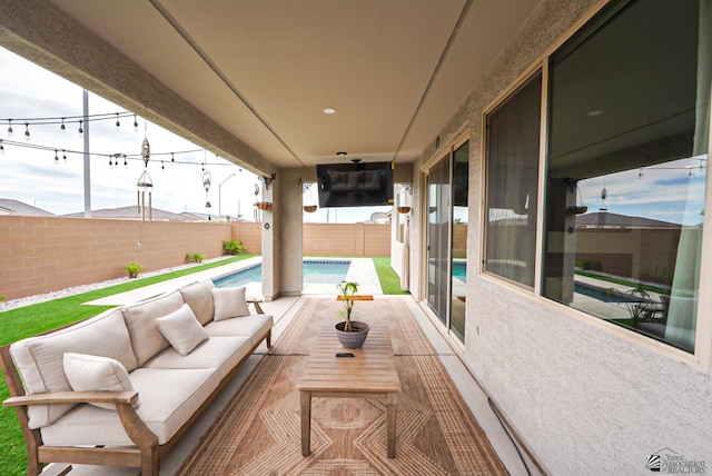 7563 E 35th Ln, Yuma, AZ 85365 - fenced backyard featuring an outdoor living space and a patio area