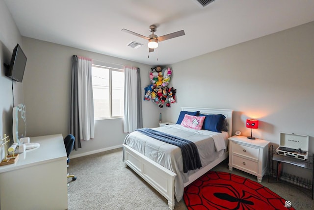 7563 E 35th Ln, Yuma, AZ 85365 - carpeted bedroom with baseboards, a ceiling fan, and a desk