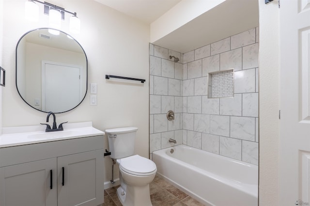 bathroom featuring toilet, bathing tub / shower combination, tile patterned floors, visible vents, and vanity