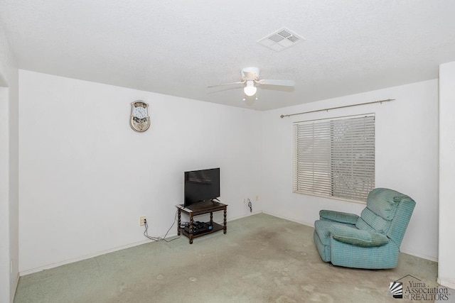 12614 E 45th Dr, Yuma, AZ 85367 - living area with visible vents, carpet flooring, a textured ceiling, and ceiling fan