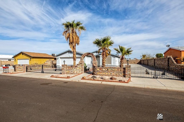 12614 E 45th Dr, Yuma, AZ 85367 - view of front of house with a gate and a fenced front yard