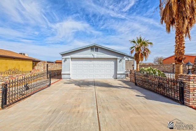 12614 E 45th Dr, Yuma, AZ 85367 - garage featuring fence and concrete driveway