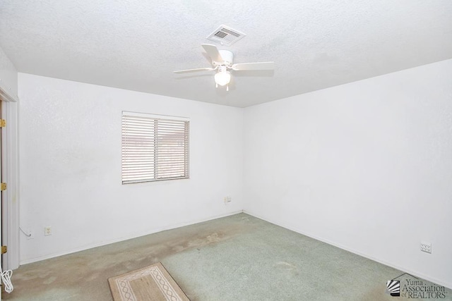 12614 E 45th Dr, Yuma, AZ 85367 - carpeted spare room featuring ceiling fan, a textured ceiling, and visible vents
