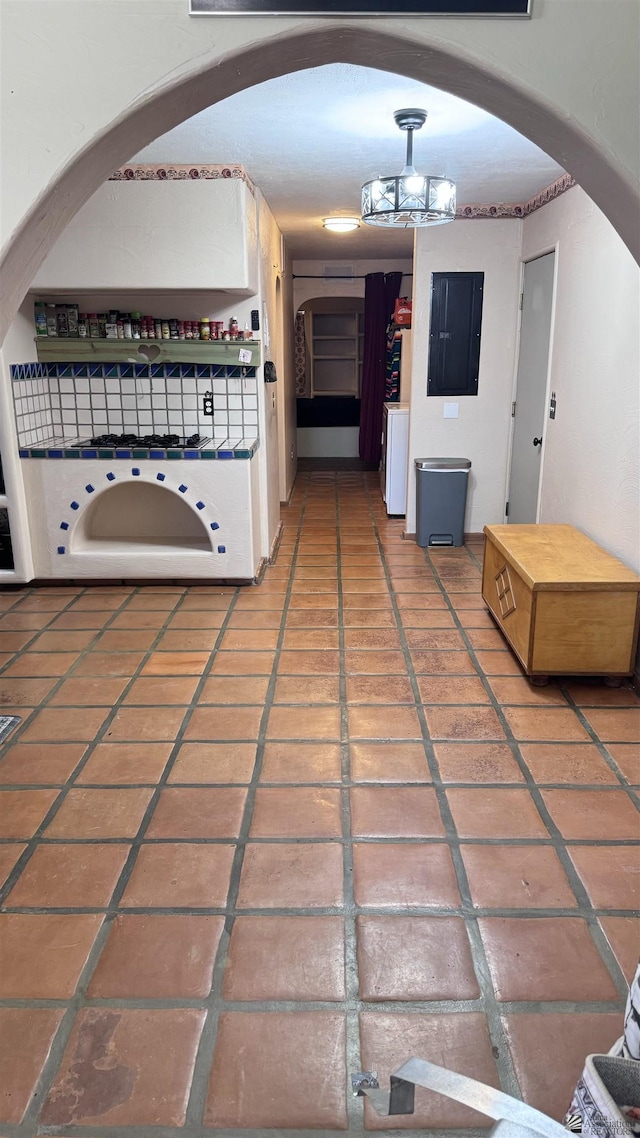 13725 E 46th St, Yuma, AZ 85367 - hall with arched walkways, electric panel, and washer / clothes dryer
