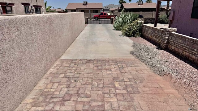 13725 E 46th St, Yuma, AZ 85367 - exterior space with fence, a gate, and a residential view