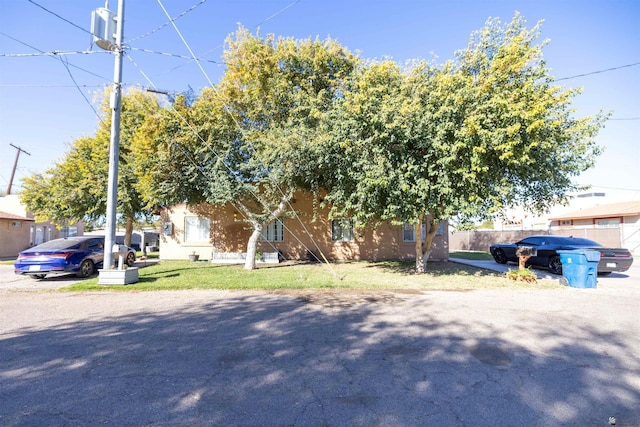 976 S 37 Avenue Unit A & Unit B, Yuma, AZ 85364 - view of front of home with stucco siding and a front lawn