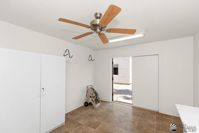 11561 E 25th Pl, Yuma, AZ 85367 - unfurnished room with a ceiling fan and light stone finish floors