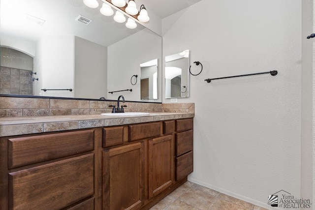 11561 E 25th Pl, Yuma, AZ 85367 - full bathroom featuring vanity and baseboards
