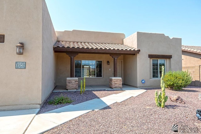 11561 E 25th Pl, Yuma, AZ 85367 - view of front facade featuring stucco siding and a tiled roof