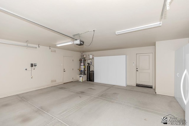 11561 E 25th Pl, Yuma, AZ 85367 - garage with water heater and refrigerator