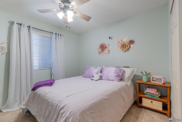 bedroom featuring carpet floors and a ceiling fan