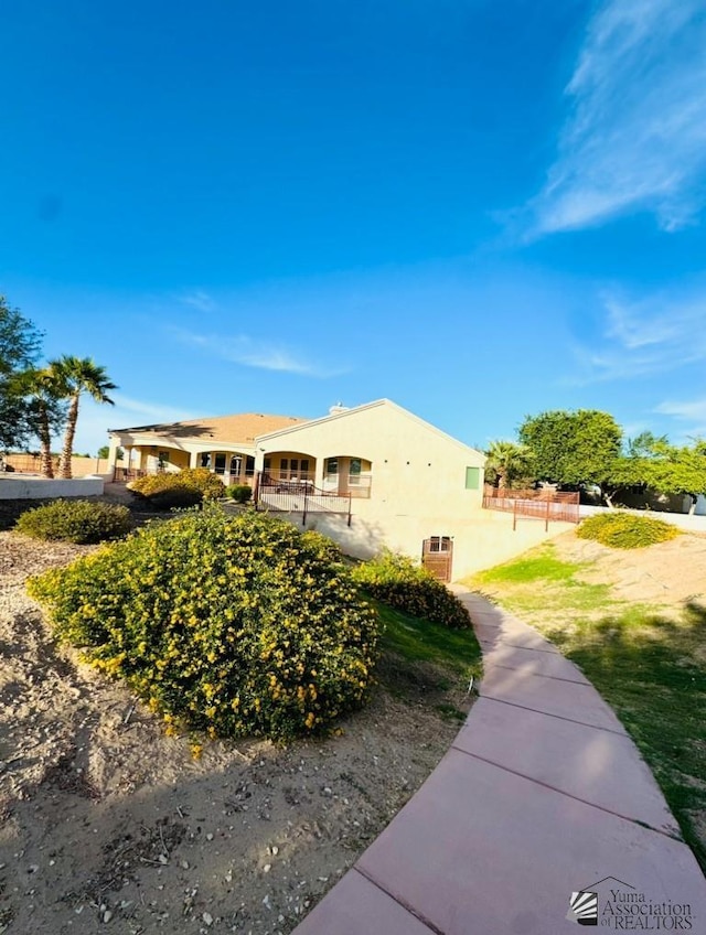 exterior space with stucco siding