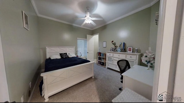 carpeted bedroom with ornamental molding and ceiling fan