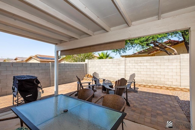 4452 S Agave Ave, Yuma, AZ 85365 - view of patio featuring outdoor dining area, a fire pit, and grilling area