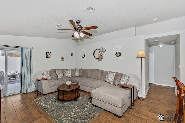4452 S Agave Ave, Yuma, AZ 85365 - living room featuring ceiling fan, wood finished floors, and a textured ceiling