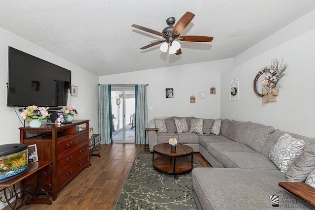 4452 S Agave Ave, Yuma, AZ 85365 - living room with vaulted ceiling, a textured ceiling, dark wood-style flooring, and a ceiling fan