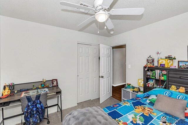 4452 S Agave Ave, Yuma, AZ 85365 - carpeted bedroom with a closet and a ceiling fan