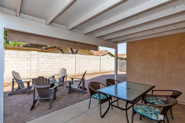 4452 S Agave Ave, Yuma, AZ 85365 - fenced backyard featuring a patio, outdoor dining space, and an outdoor fire pit