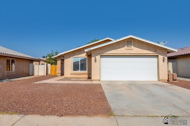 4452 S Agave Ave, Yuma, AZ 85365 - ranch-style house featuring driveway, stucco siding, and a garage