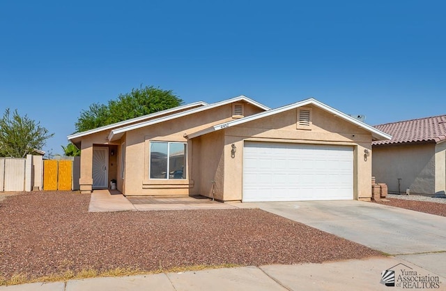 4452 S Agave Ave, Yuma, AZ 85365 - single story home featuring stucco siding, driveway, and an attached garage