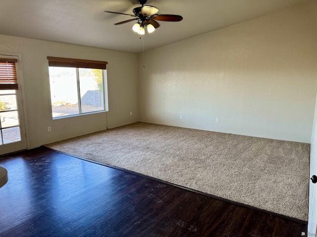 11278 E 24th Pl, Yuma, AZ 85367 - carpeted spare room featuring a ceiling fan and wood finished floors