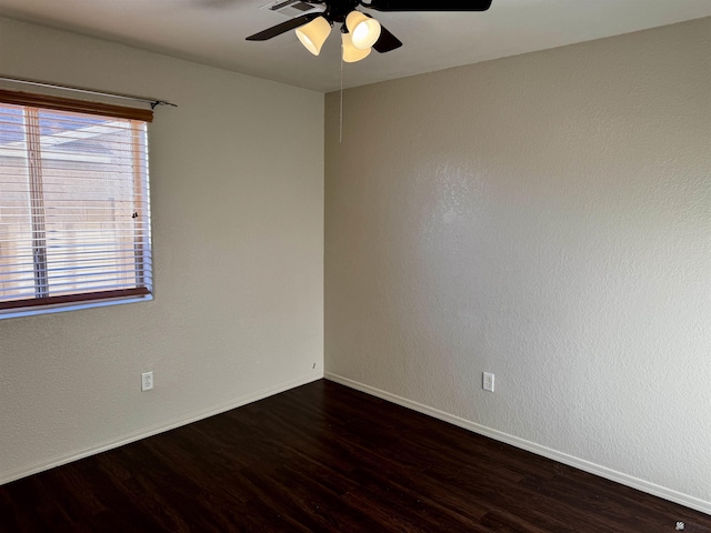 11278 E 24th Pl, Yuma, AZ 85367 - spare room with ceiling fan, dark wood-style floors, and baseboards
