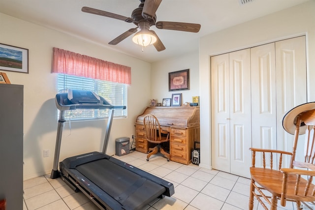 14530 E 55th St, Yuma, AZ 85367 - exercise area featuring baseboards, ceiling fan, and light tile patterned floors