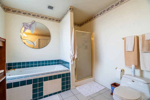 14530 E 55th St, Yuma, AZ 85367 - full bathroom with toilet, tile patterned floors, visible vents, a garden tub, and a stall shower