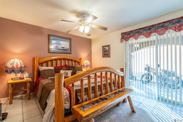 14530 E 55th St, Yuma, AZ 85367 - bedroom featuring light tile patterned floors, a ceiling fan, and access to exterior