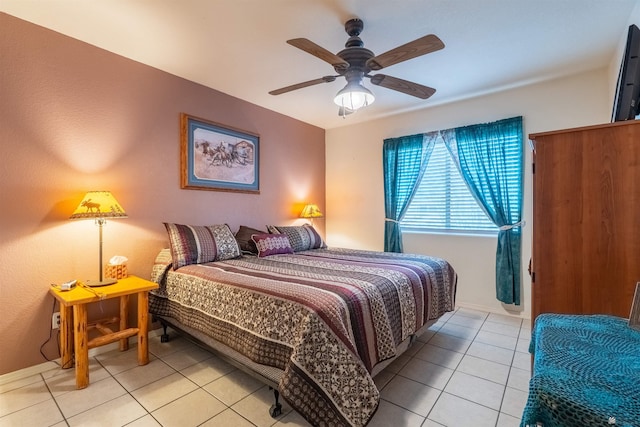 14530 E 55th St, Yuma, AZ 85367 - bedroom featuring light tile patterned flooring, baseboards, and ceiling fan