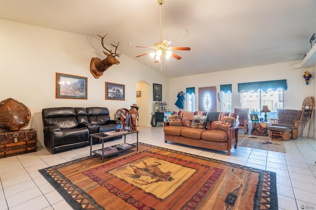 14530 E 55th St, Yuma, AZ 85367 - tiled living area with arched walkways, ceiling fan, and lofted ceiling