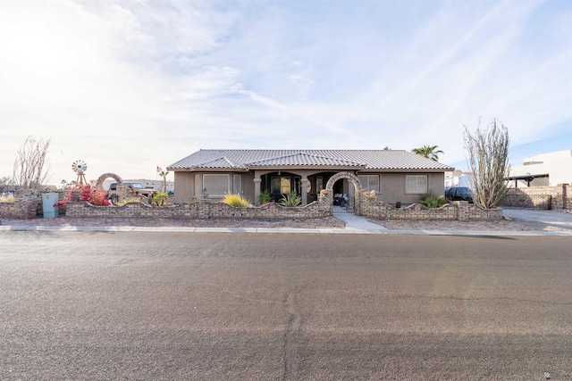 14530 E 55th St, Yuma, AZ 85367 - view of front of property with a tiled roof and stucco siding