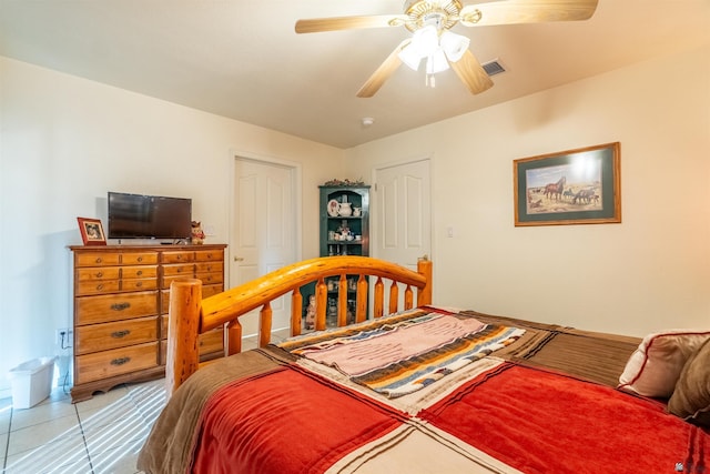 14530 E 55th St, Yuma, AZ 85367 - bedroom featuring a ceiling fan, light tile patterned flooring, and visible vents
